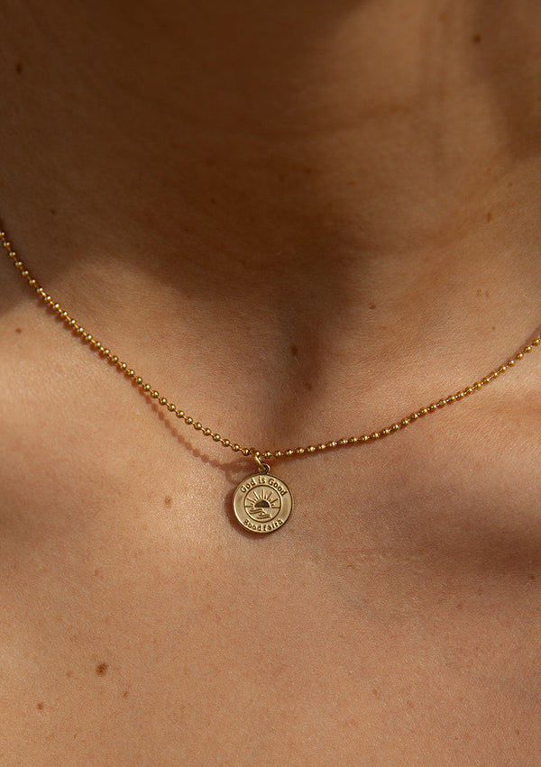 gold God is good pendant